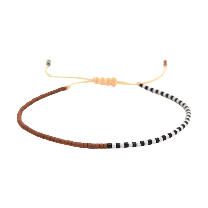 Bracelet à perles Miyuki brun et noir-blanc, cordon beige ajustable, style bohème chic délicat.