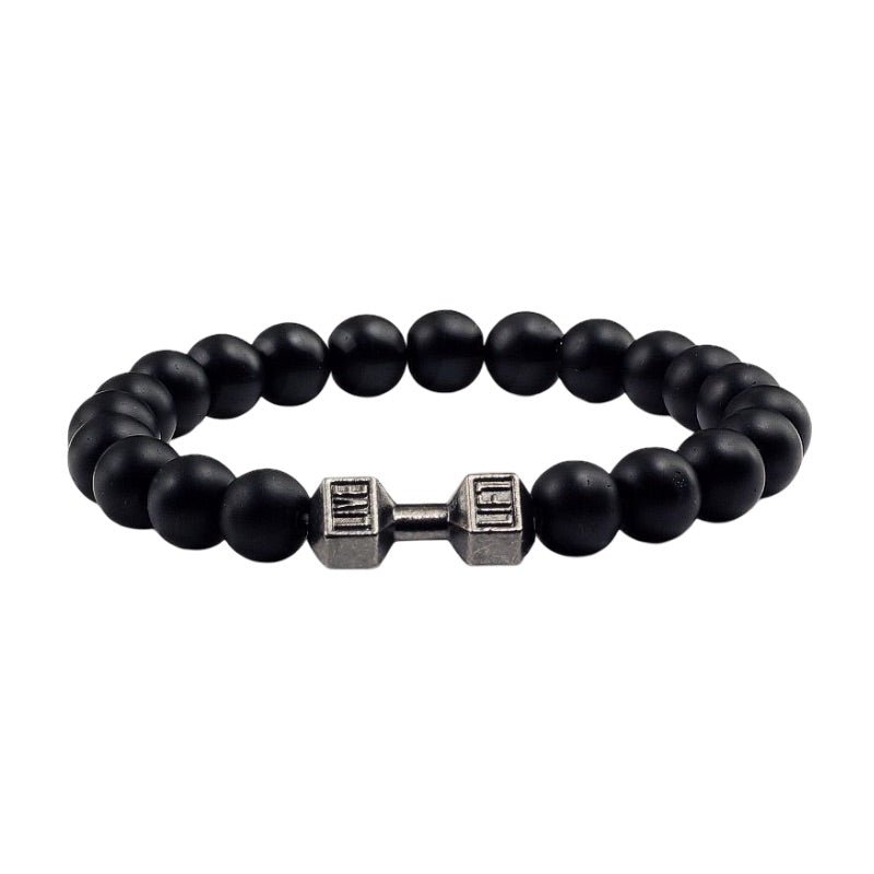 Bracelet à perles noires mat avec barre d'haltère argentée centrale, style musculation.