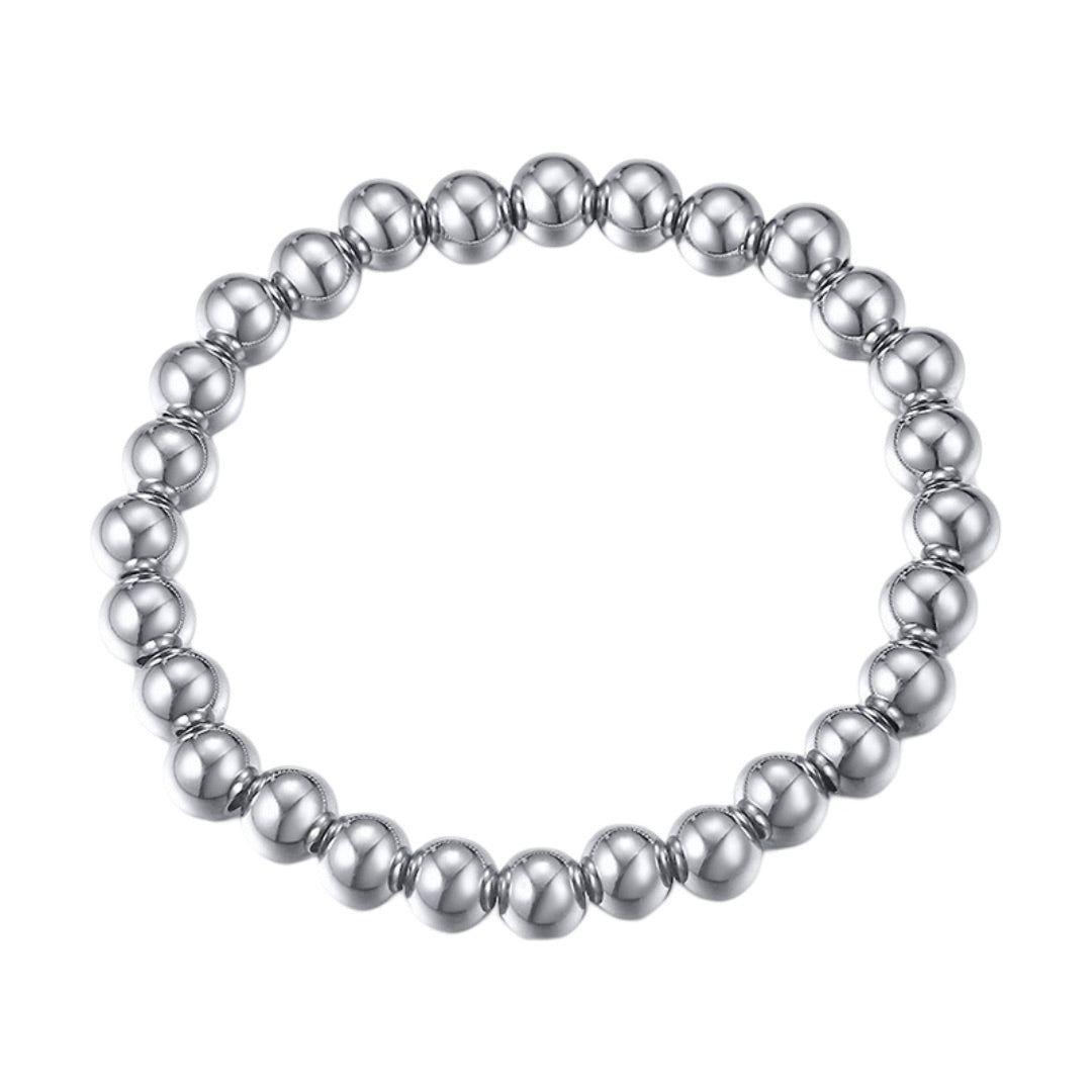 Bracelet élastique en acier inoxydable argenté avec perles polies rondes et lisses.