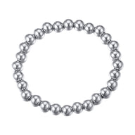 Bracelet élastique en acier inoxydable argenté avec perles polies rondes et lisses.