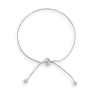 Bracelet ajustable en titane argenté avec fermoir coulissant et extrémités boules fines.