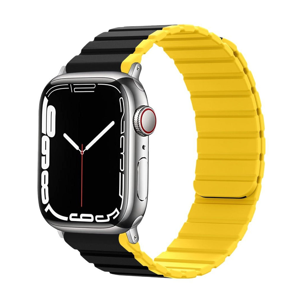 Bracelet Apple Watch en silicone bicolore noir et jaune avec fermeture magnétique double face, style moderne et confortable.