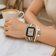 Bracelet Apple Watch en cuir beige avec motif arbre de vie argenté, style multi-brins élégant pour femme.