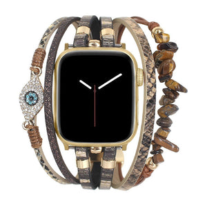 Elegantes Apple Watch Armband, feine vegane Kunstlederriemen, braune Halbedelsteine, funkelnder Schutzaugen-Charm, Modell Mercuria
