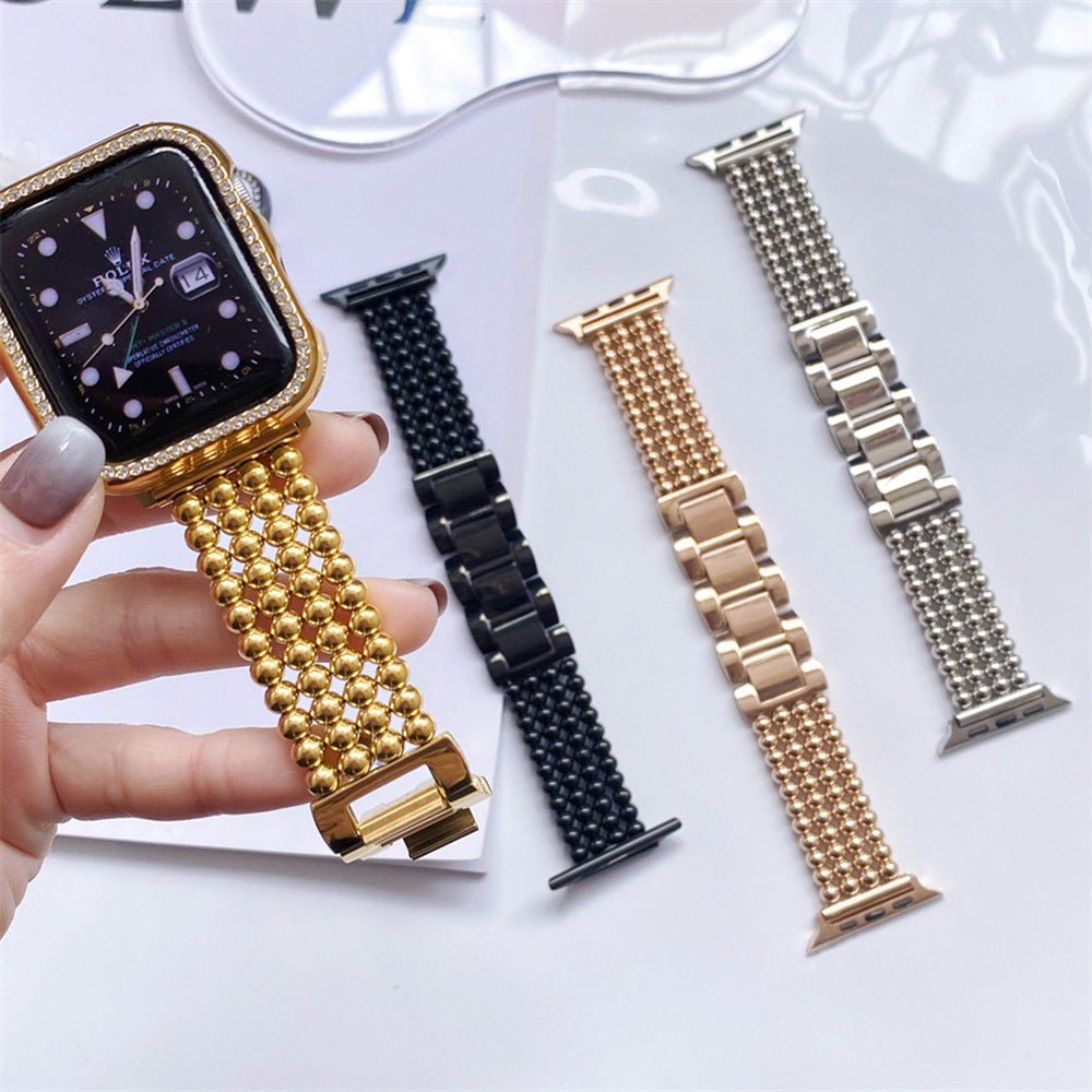 Bracelet pour Apple Watch en acier inoxydable à perles métalliques, finitions or, noir mat, rose gold et argent, fermoir.
