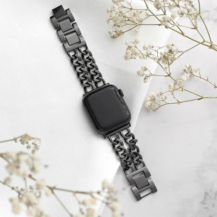 Bracelet Apple Watch en acier inoxydable noir, maille gourmette double chaîne, fermoir sécurisé, style moderne et élégant.