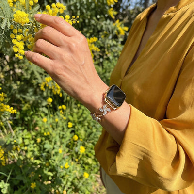 Apple Watch Armband aus Metalllegierung, drehbare Lotusblume, verstellbare Clip-Glieder, für Damen, Modell Lossia