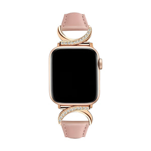 Bracelet Apple Watch en cuir rose pâle avec boucle en C dorée ornée de strass scintillants.