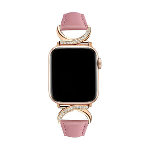 Bracelet Apple Watch en cuir rose avec boucle en C dorée ornée de strass scintillants, style féminin et raffiné.
