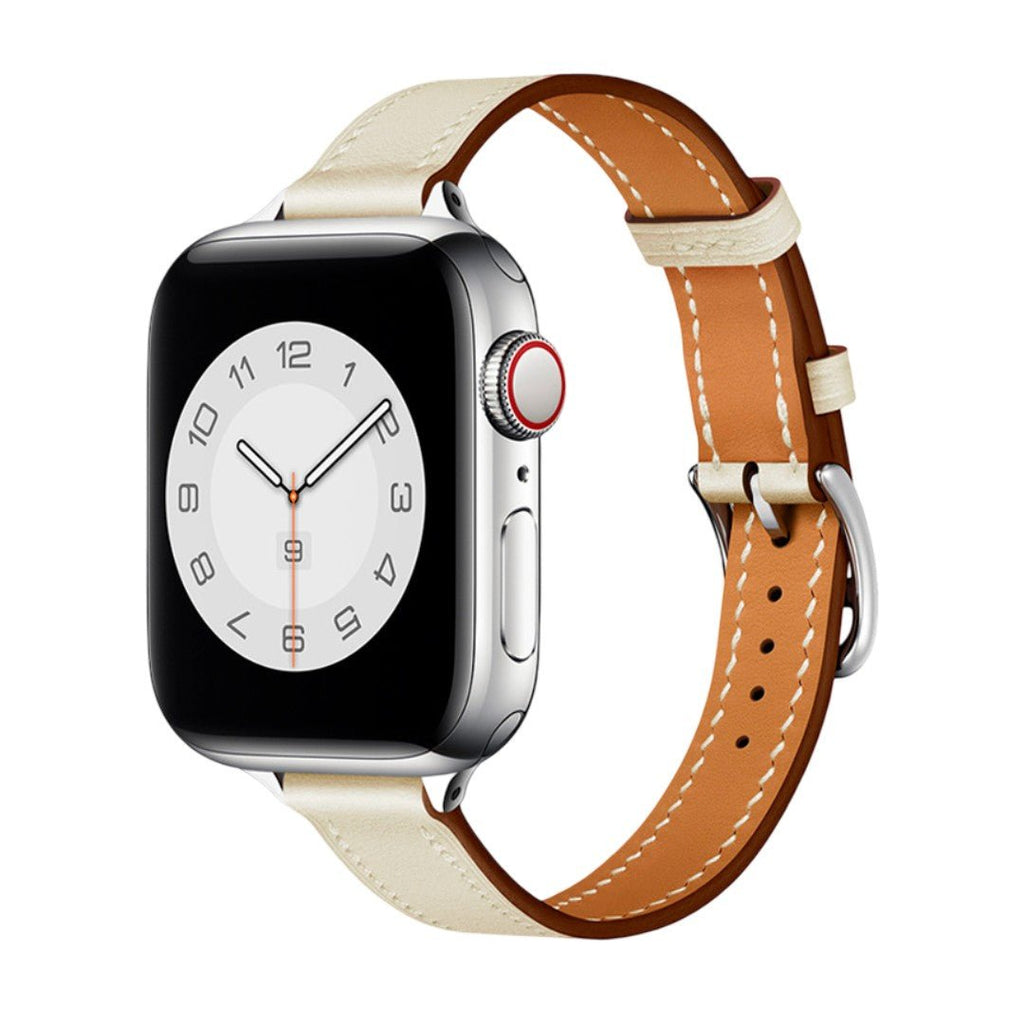 Bracelet Apple Watch en cuir beige à couture blanche contrastée, boucle argentée, look élégant et raffiné.