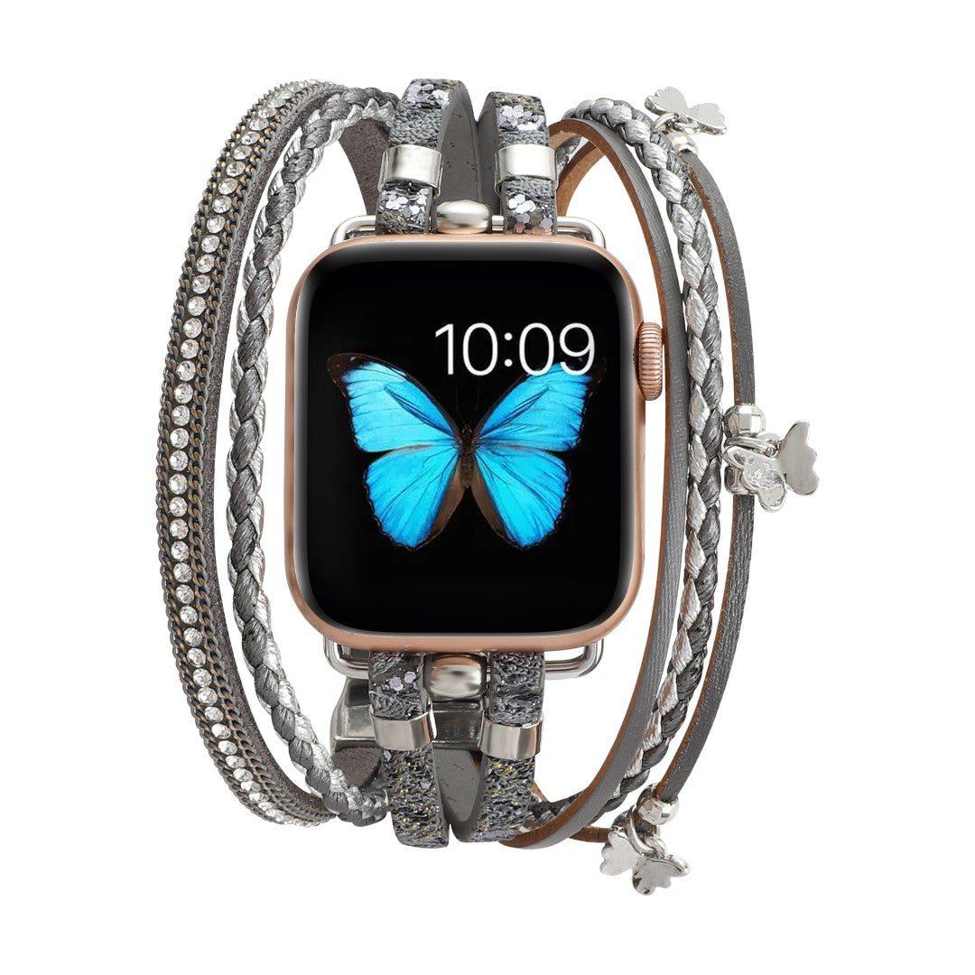 Bracelet Apple Watch en cuir gris multi-rangs avec strass brillants et fermoir boucle argenté, design papillon féminin.