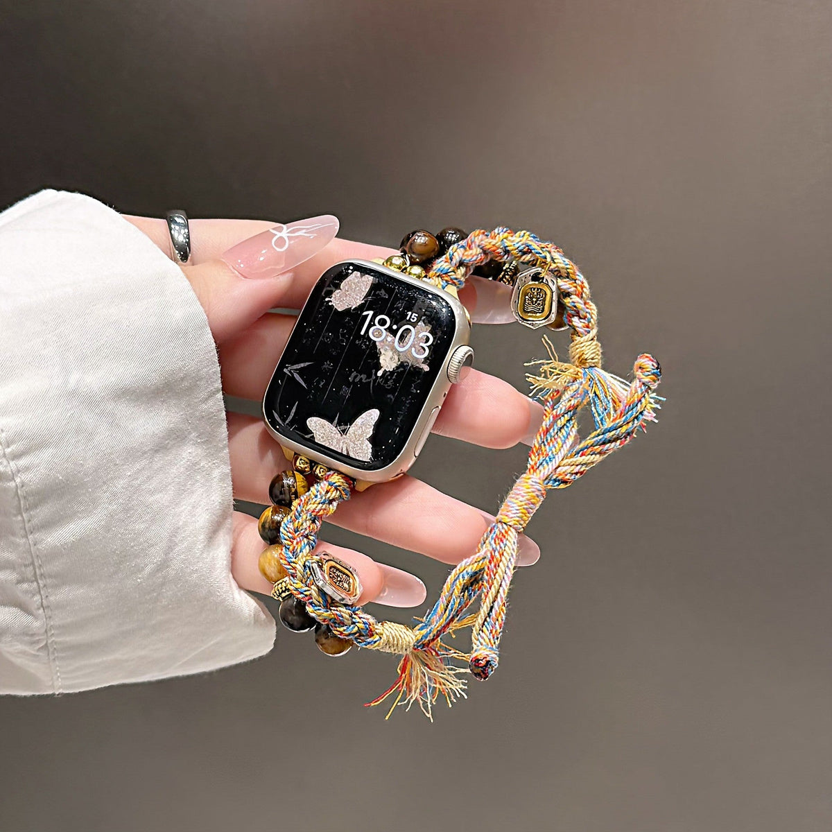 Natural Tiger’s Eye Apple Watch Bracelet, multicolored braided cord, gold charms, Tenzin model