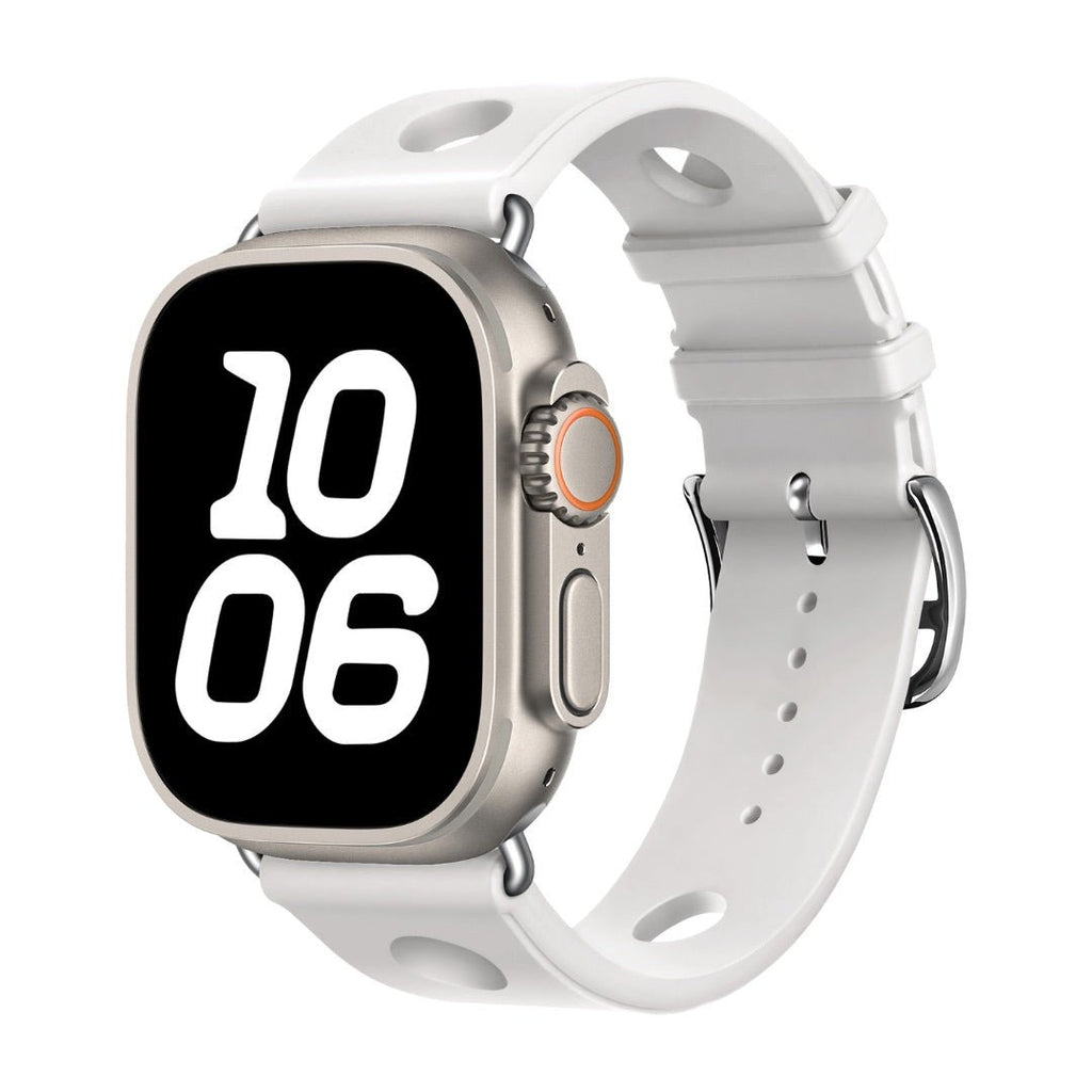 Bracelet Apple Watch blanc en silicone perforé avec fermoir en acier inoxydable, style respirant et dynamique.