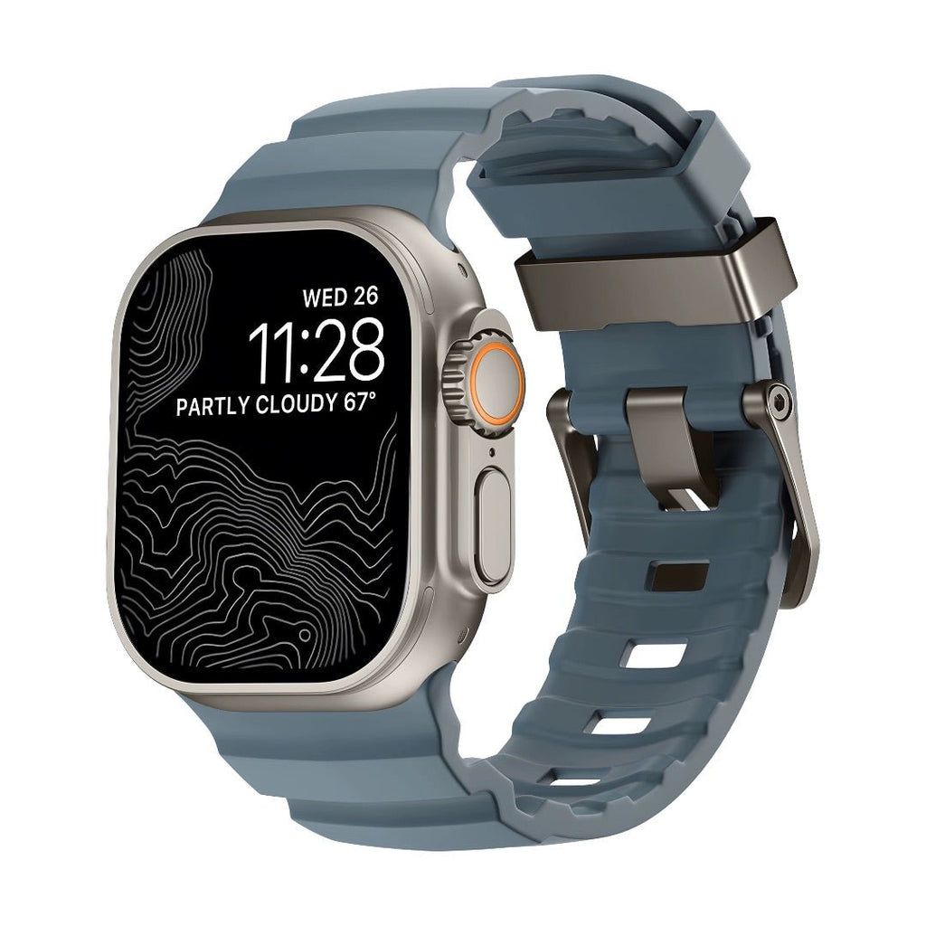 Bracelet Apple Watch en silicone bleu gris, boucle solide métallique et design moderne pour 44-49mm.