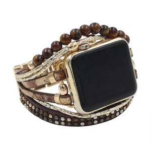 Bracelet large en cuir tressé brun avec pierres naturelles rondes et clous métalliques pour Apple Watch dorée.