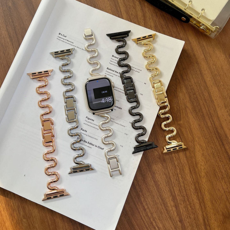 Apple Watch bracelet with wavy metal links, modern S-shaped design, adjustable push-button clasp, Sydia model