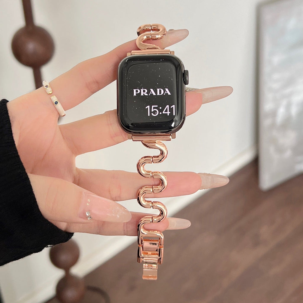 Apple Watch bracelet with wavy metal links, modern S-shaped design, adjustable push-button clasp, Sydia model