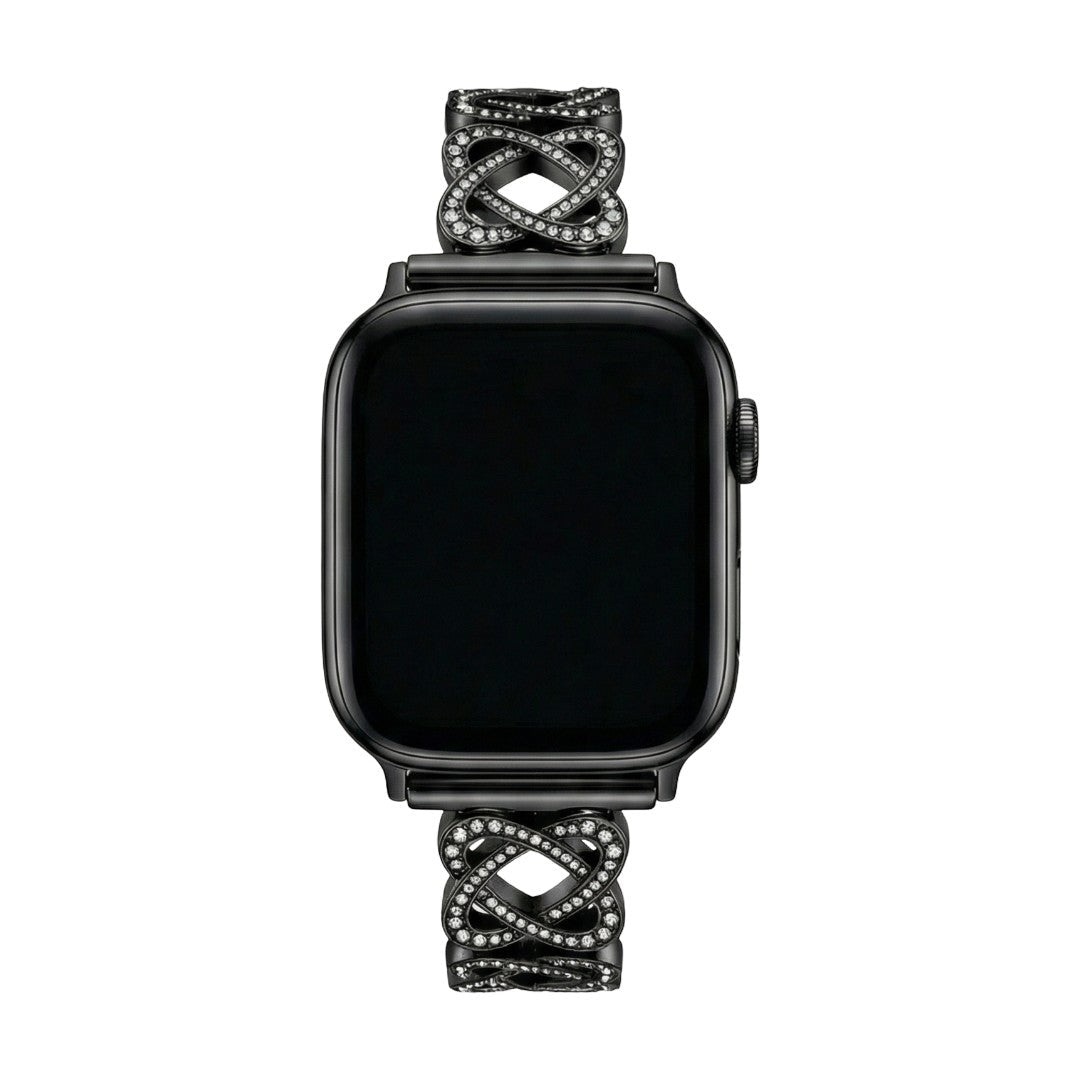Pulseira para Apple Watch em metal prateado com malhas entrelaçadas, motivo de nó infinito cravejado de zircónias, fecho de encaixe ajustável, modelo Zergone