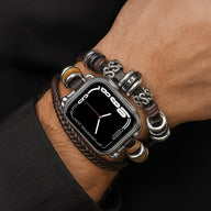 Bracelet multi-rangs pour Apple Watch avec lanière tressée noire et perles en acier brossé, style ajustable pour homme.