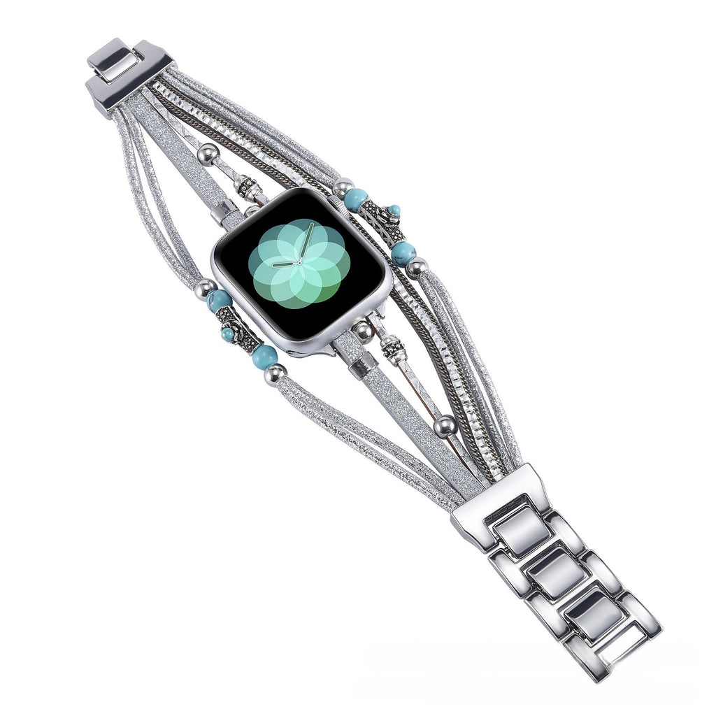 Bracelet multirangs pour Apple Watch avec perles turquoise, cordes brillantes argentées et fermoir métal éclatant.