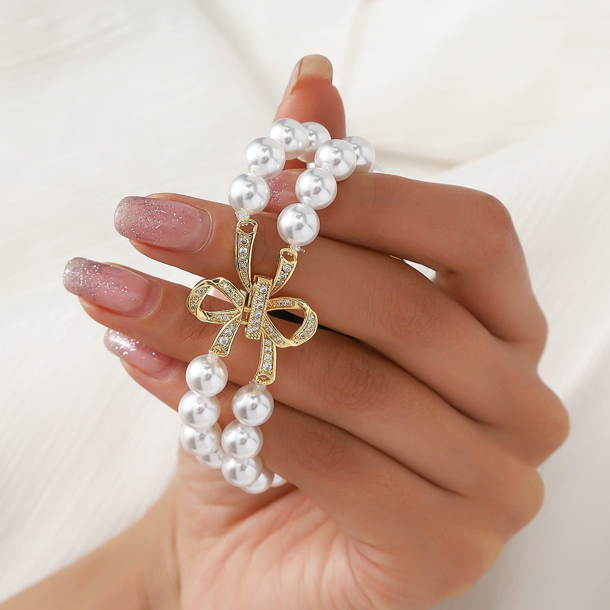 Bracelet Apple Watch perles élégantes, pour montre connectée femme avec nœud doré, élastique, modèle Vacra