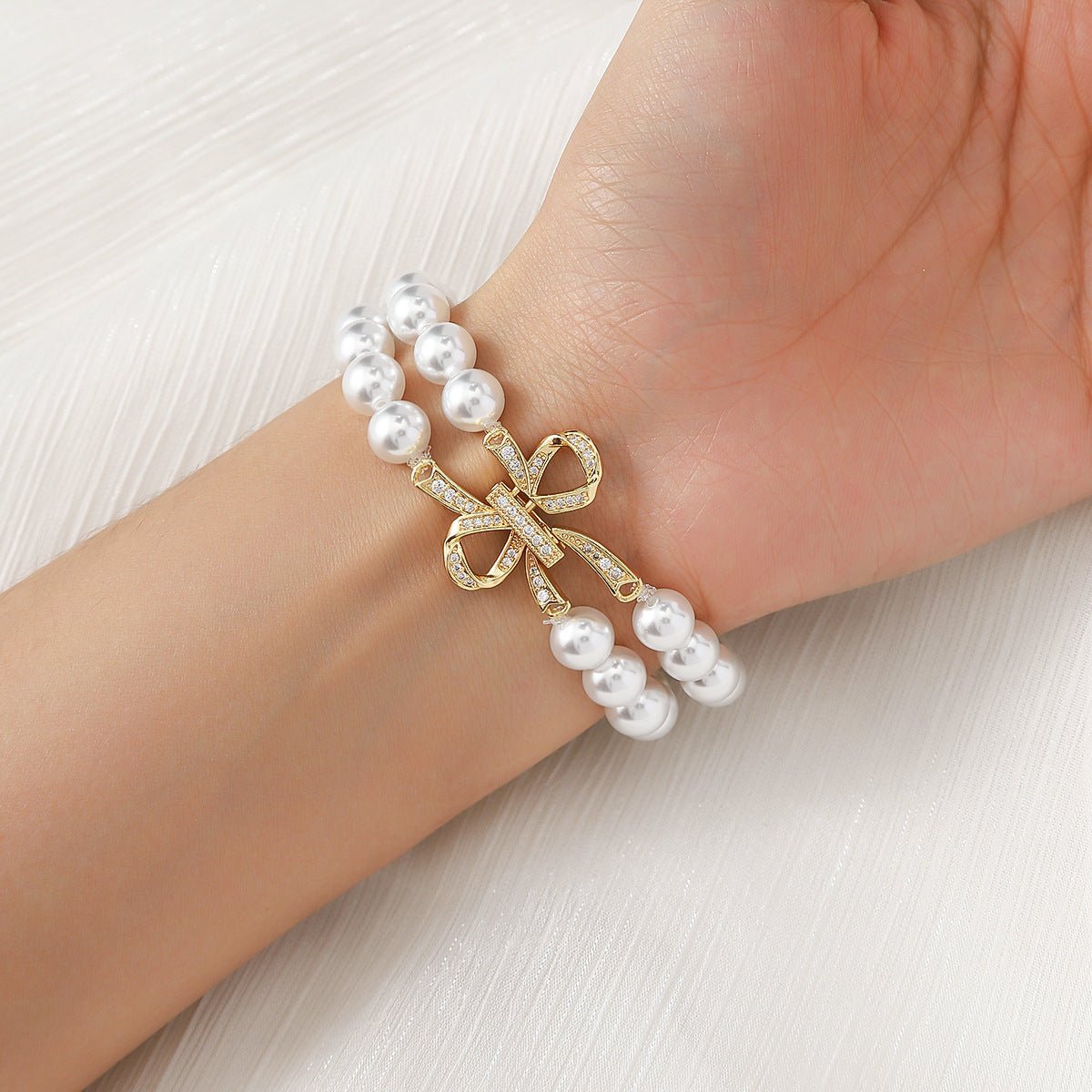 Bracelet Apple Watch perles élégantes, pour montre connectée femme avec nœud doré, élastique, modèle Vacra
