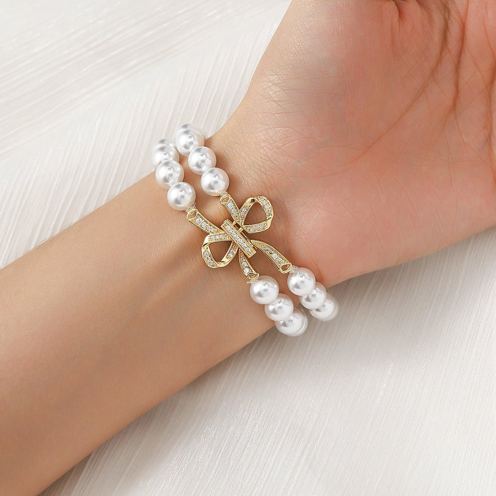 Bracelet Apple Watch perles élégantes, pour montre connectée femme avec nœud doré, élastique, modèle Vacra