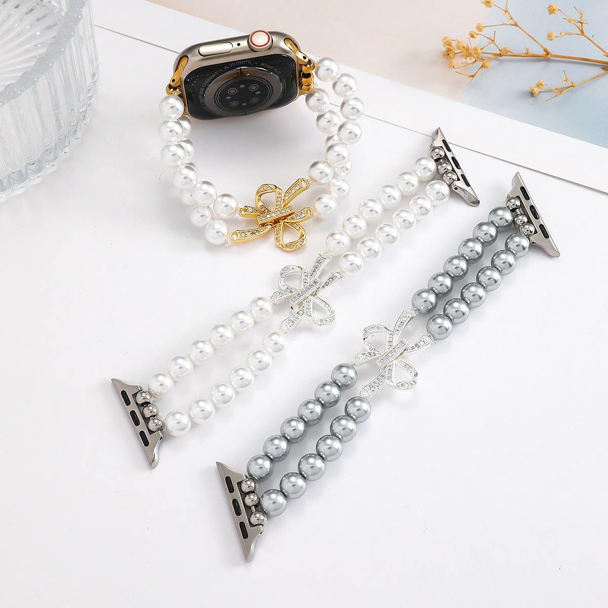 Bracelet Apple Watch perles élégantes, pour montre connectée femme avec nœud doré, élastique, modèle Vacra