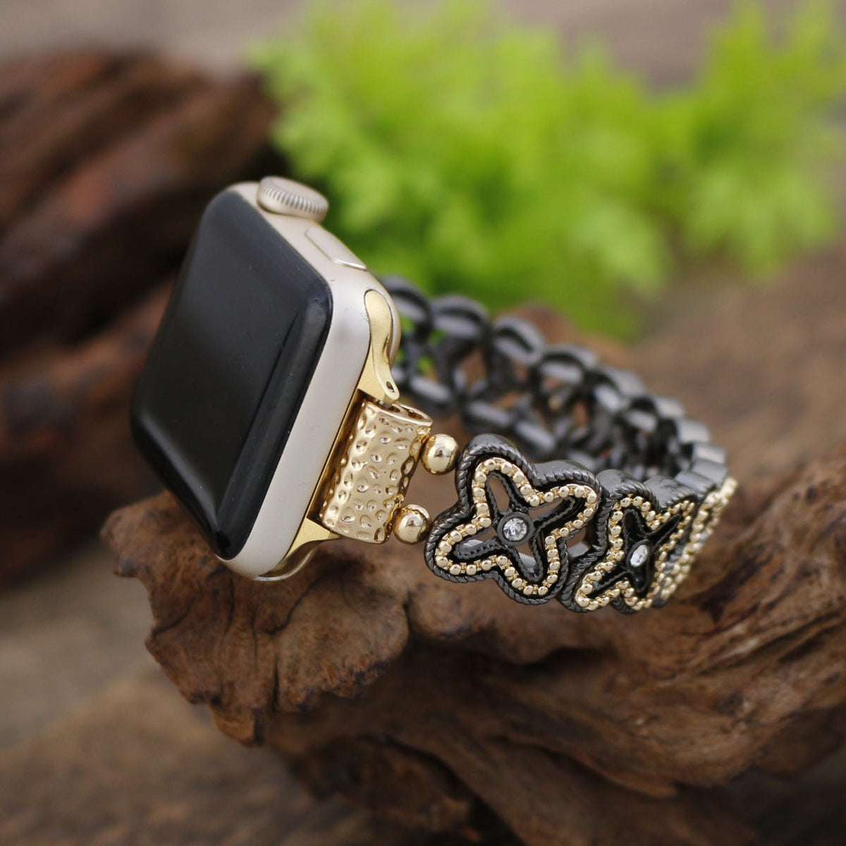 Apple Watch Armband mit durchbrochenem Blumenmuster, Strasssteinen und zweifarbiger Ausführung, Modell Harpie