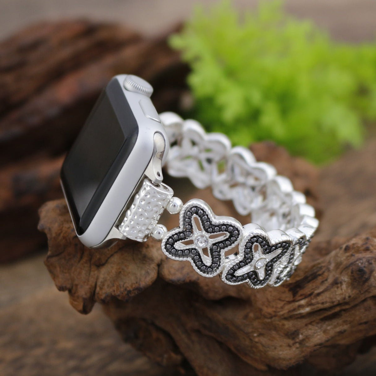 Apple Watch Armband mit durchbrochenem Blumenmuster, Strasssteinen und zweifarbiger Ausführung, Modell Harpie