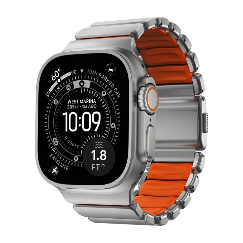 Bracelet Apple Watch en titane gris clair avec intérieur souple orange, design robuste et élégant pour Apple Watch Ultra.
