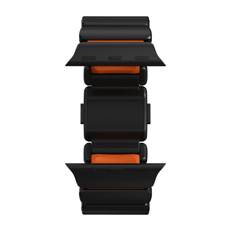 Bracelet Apple Watch Ultra en titane noir mat avec intérieur orange, design robuste et segments articulés souples en FKM.