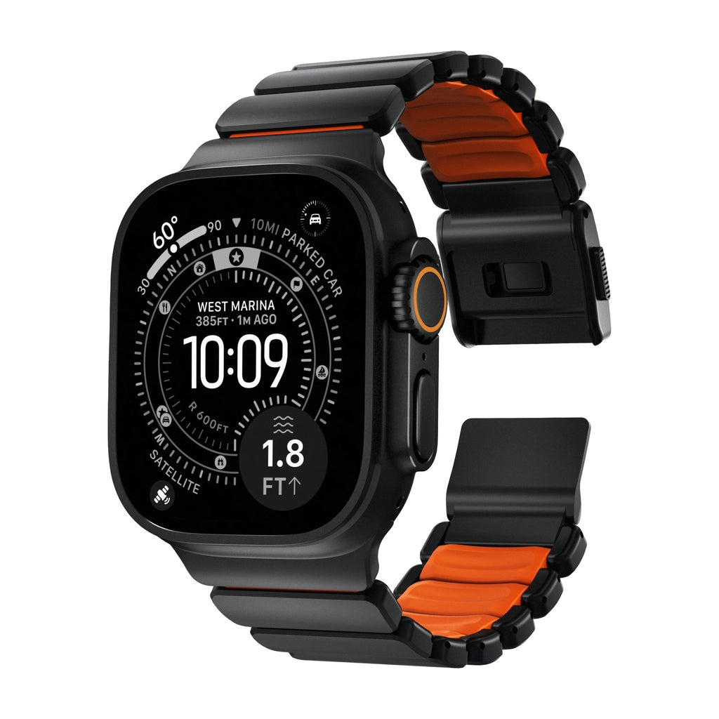 Bracelet Apple Watch Ultra en titane gris mat avec intérieur en FKM orange vif, design segmenté souple et robuste.