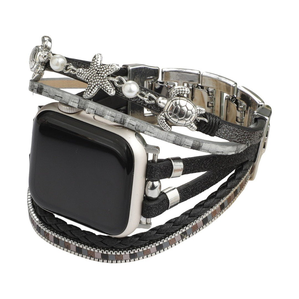 Bracelet Apple Watch noir style tropical chic avec perles argentées, tortue et étoile de mer en métal, simili vegan.