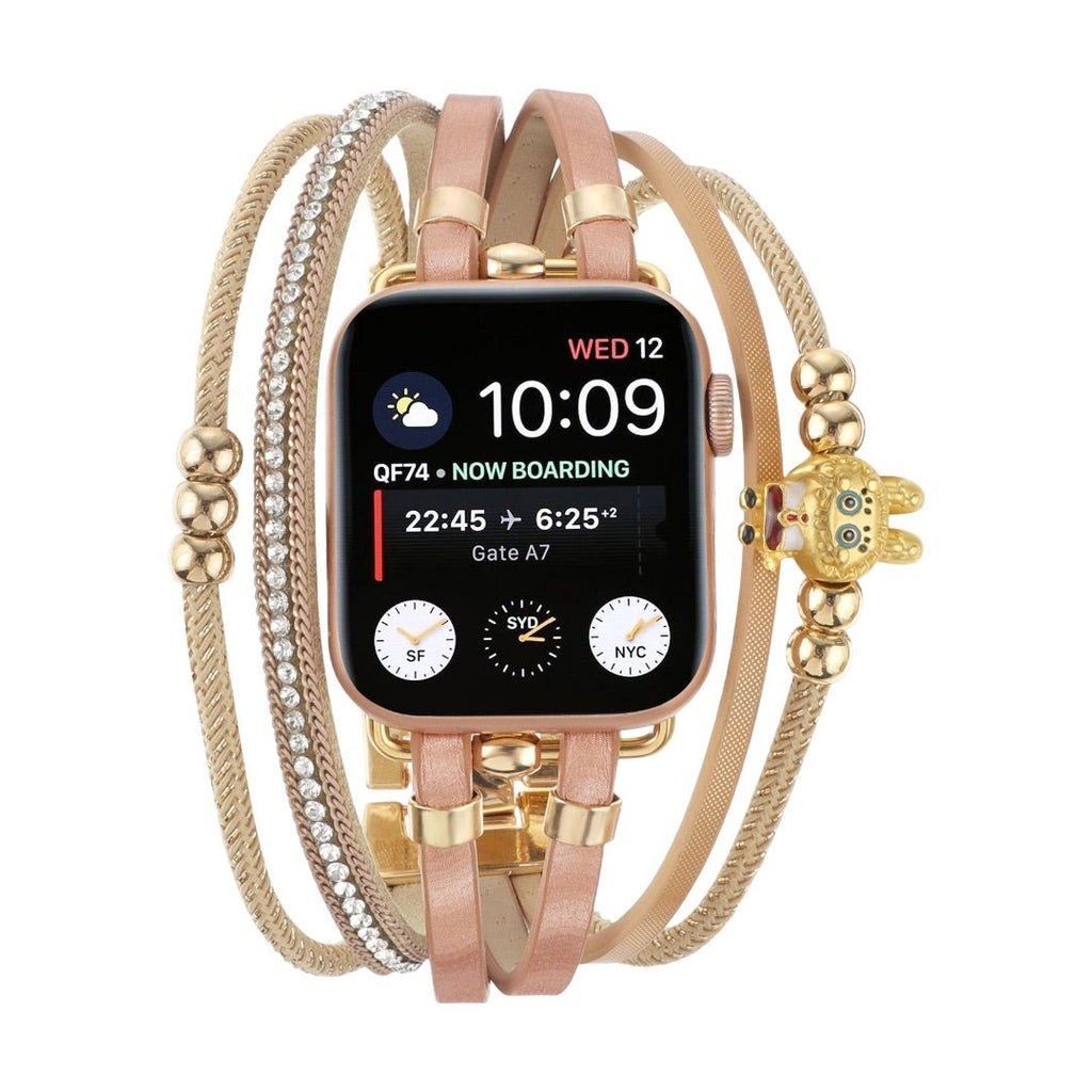 Bracelet Apple Watch doré multi-brins avec perles, strass brillants et breloque ours en métal doré.