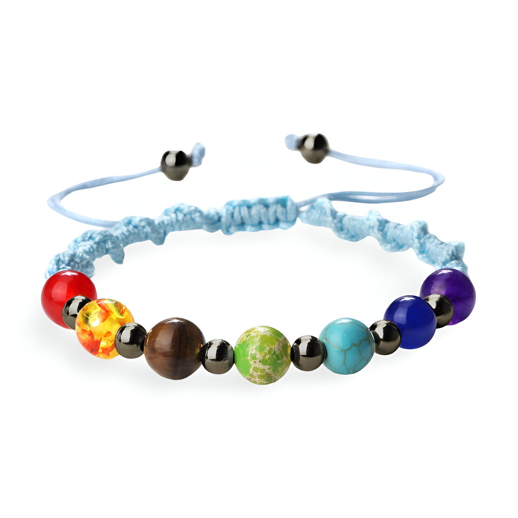 Bracelet aux 7 chakras en corde bleu clair avec perles rondes colorées en pierres naturelles.