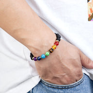 Bracelet mixte aux 7 chakras en pierres volcaniques noires et pierres naturelles multicolores, style Kiru.