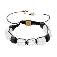 Bracelet Solva en corde noire avec pierres naturelles blanches et noires, fermoir doré ajustable.