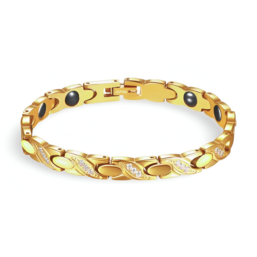 Bracelet femme en titane or avec hématites rondes noires et détails incurvés élégants.