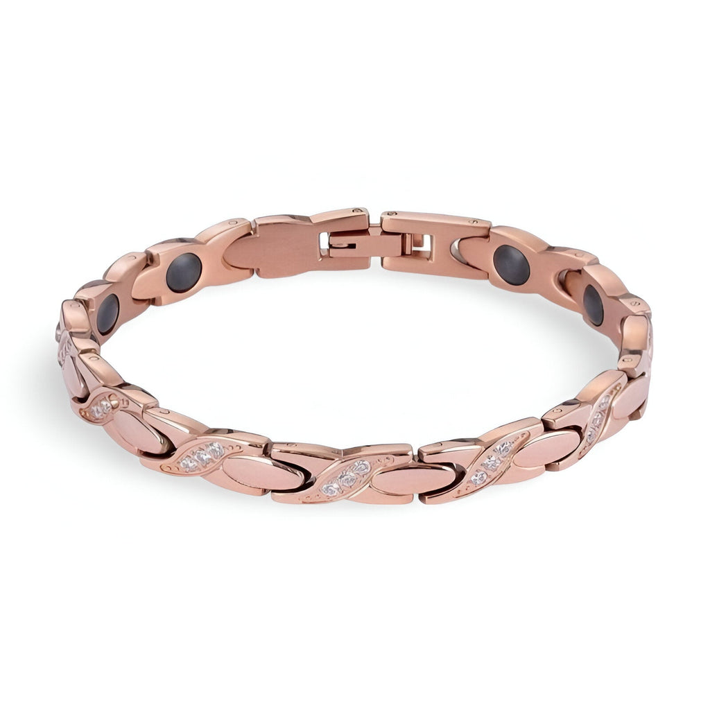 Bracelet femme en titane or rosé avec pierres hématite noires et détails brillants entrelacés.