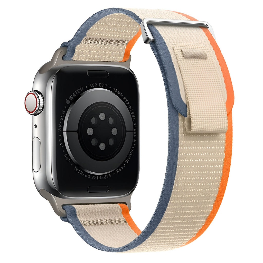 Bracelet Apple Watch Elios nylon beige avec bordure orange et fermeture velcro bleue.