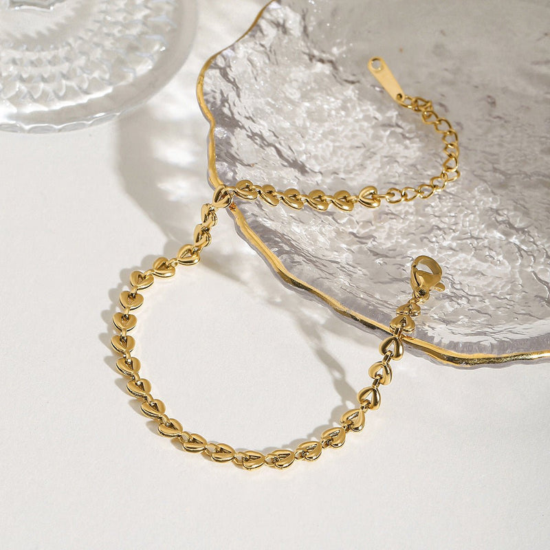 Bracelet chaîne à cœurs plats, doré, en acier inoxydable, pour femme, modèle Vionna - La Boutique du Bracelet