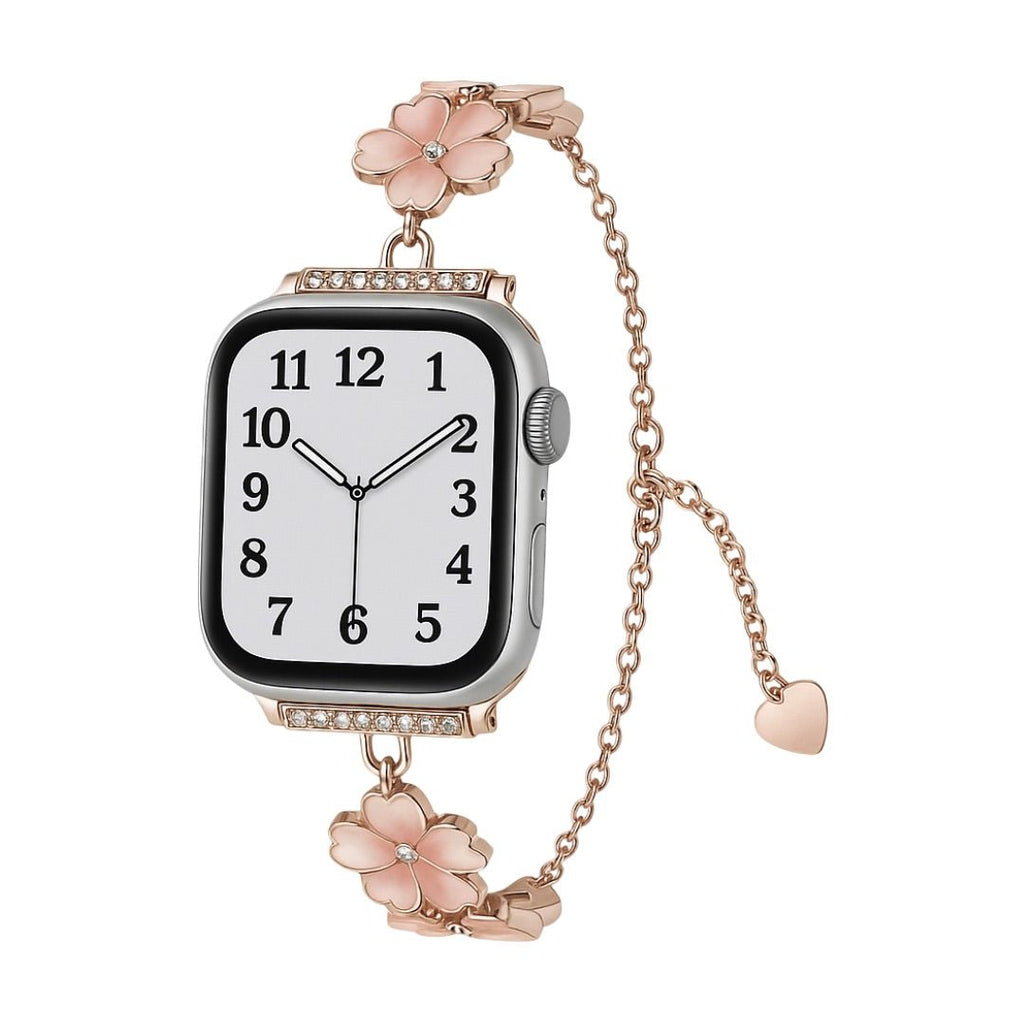 Bracelet chaîne doré rose pour Apple Watch avec fleurs de cerisier féminines en métal et détail cœur suspendu.