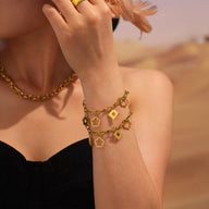 Bracelet chaîne, pendentifs fleurs, doré, en acier inoxydable, pour femme, modèle Elinia - La Boutique du Bracelet