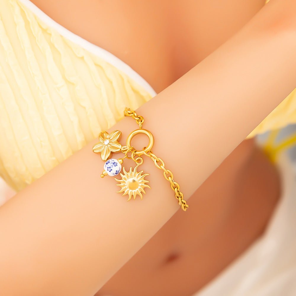 Bracelet charms florals, en acier inoxydable, fleur et soleil, pour femme, modèle Inime - La Boutique du Bracelet