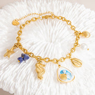 Bracelet charms marins, en acier inoxydable, perles et coquillages, pour femme, modèle Uru - La Boutique du Bracelet