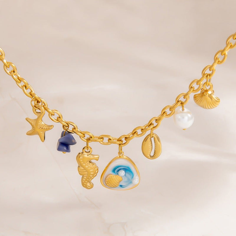 Bracelet charms marins, en acier inoxydable, perles et coquillages, pour femme, modèle Uru - La Boutique du Bracelet