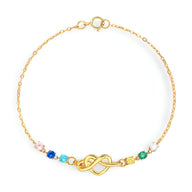 Bracelet fin en or avec cœur emmêlé et perles colorées sur chaîne délicate.