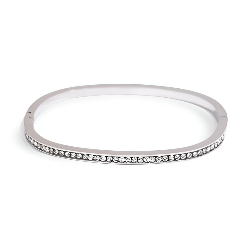 Bracelet jonc en acier inoxydable plaqué or avec rangée de petits cristaux scintillants.