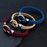 Bracelets cordon Pedro en acier inoxydable, bleu marine, beige et bordeaux, tailles variées.